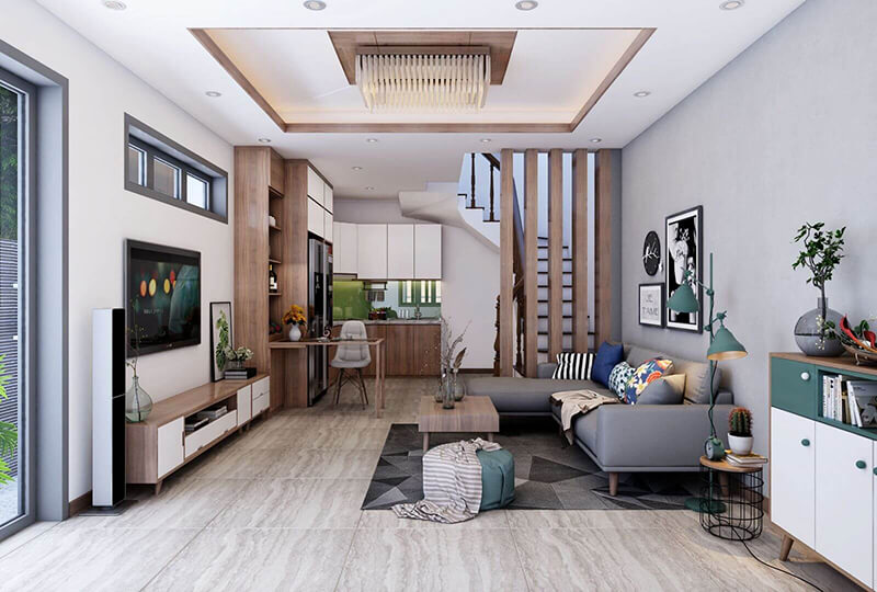 Căn phòng khách nhà ống 2 tầng phong cách hiện đại được bố trí nội thất hợp lý tạo không gian gọn gàng